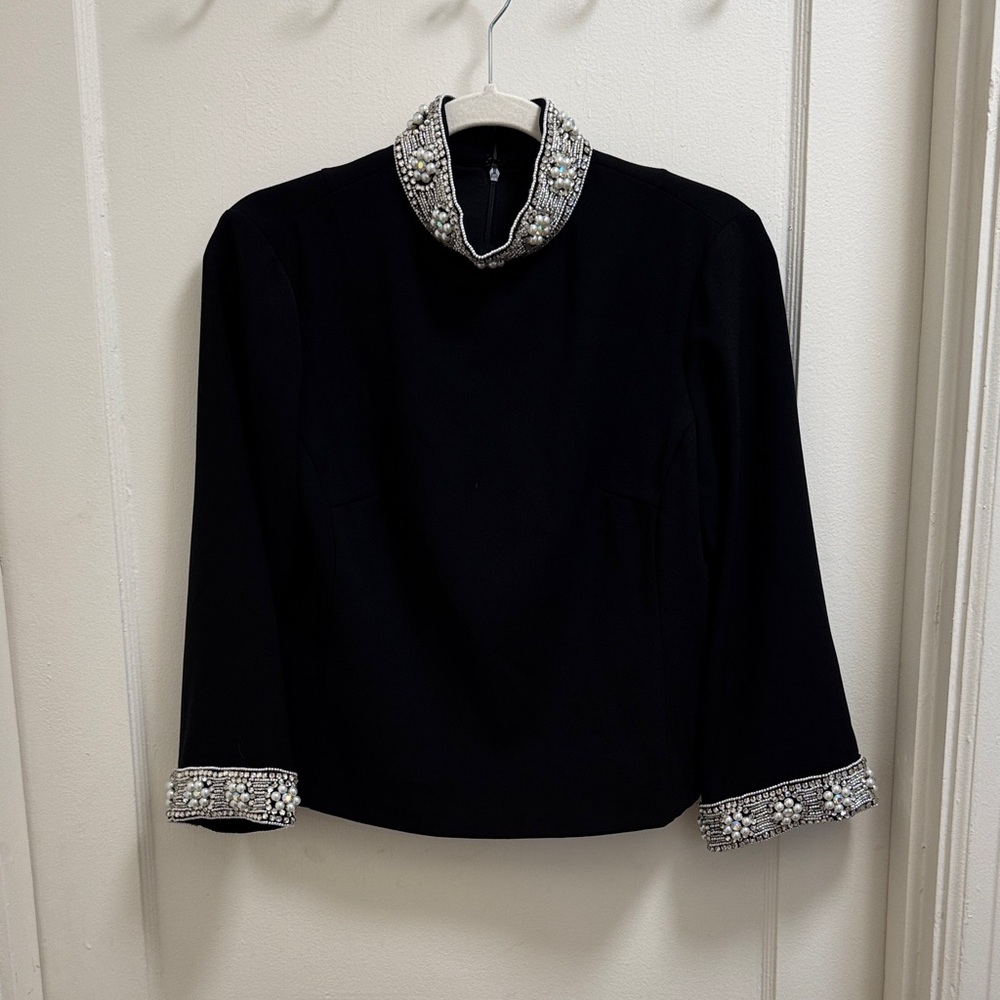 Elegant Black Top with Embellished Collar and Cuffs